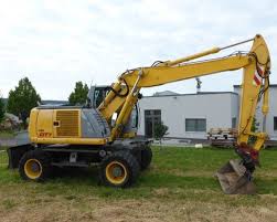 New Holland MhPlus MhPlus Mh5.6 Niveau III Excavateur de niveau III Atelier officiel de réparation Manuel technique de réparation